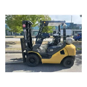 Used Komatsu LPG forklift with triplex mast and solid tires – left side view