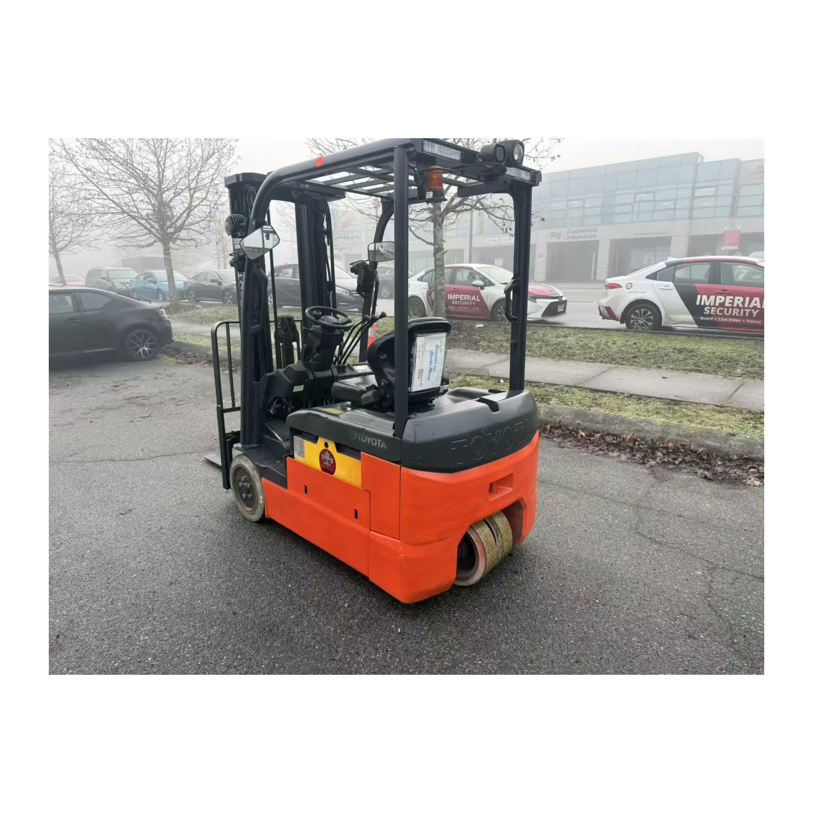 Toyota 8FBEH18U electric forklift, rear three-quarter view